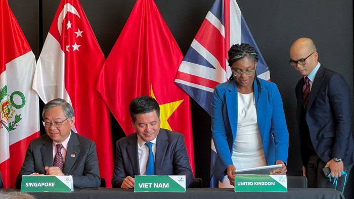 Singapore and Vietnam trade ministers alongside UK Conservative leader Kemi Badenoch during the signing of the deal for the UK to join the CPTPP in New Zealand last year