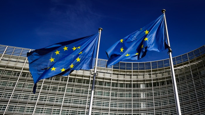 EU flags are seen outside European Commission Berlaymont building in Brussels