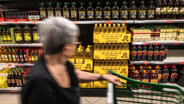 Shelves of olive oil at a Mercadona SA supermarket