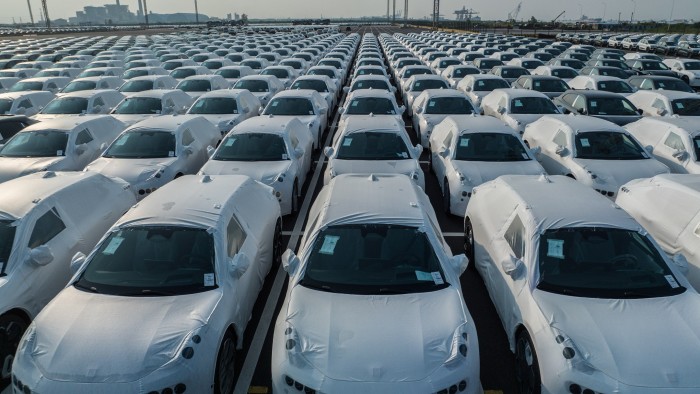 Rows of electric vehicles bound for shipment to Europe