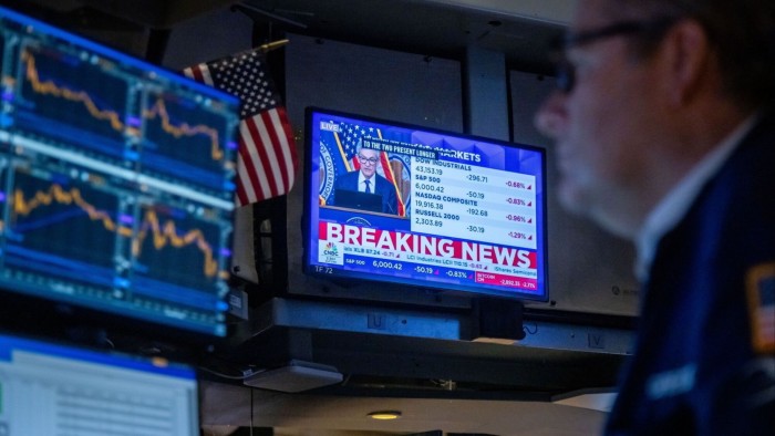 A television station broadcasts Jay Powell, chair of the US Federal Reserve, on the floor of the New York Stock Exchange