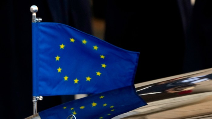 The European flag is seen on the car of European Council President Charles Michel