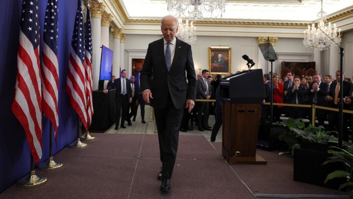 US President Joe Biden leaves the stage after his speech at the state department in Washington on Monday