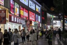 Pedestrians on the Dongmen Old Street shopping area in Shenzhen