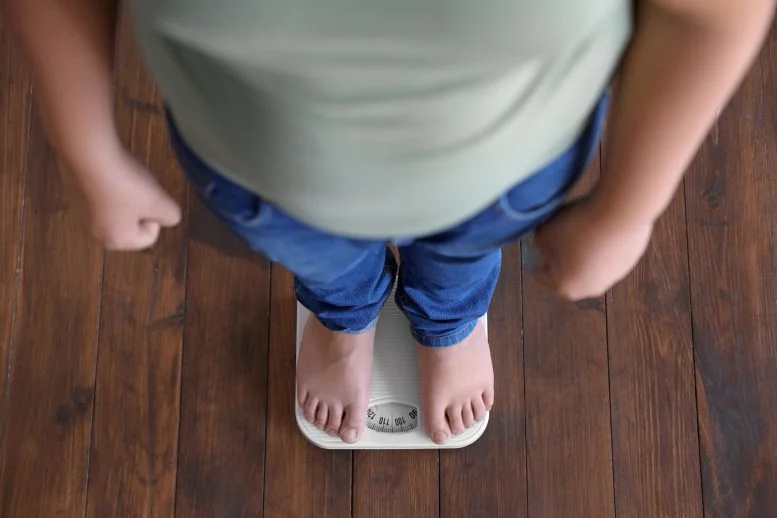 Overweight Boy Standing Floor Scale 777  215 518 jpg