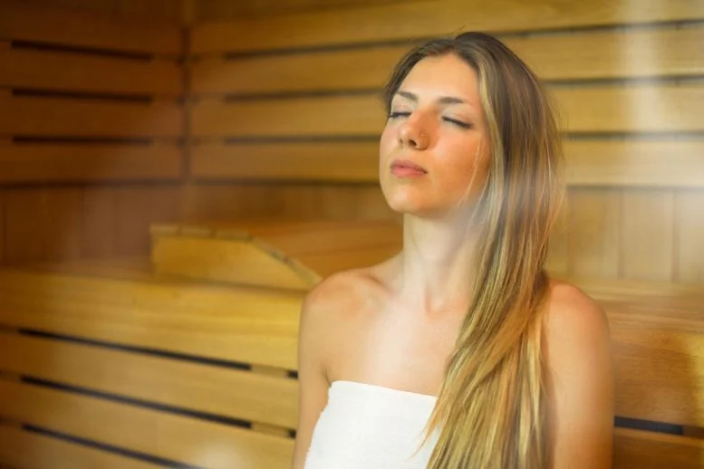 Woman Sitting in Sauna 777  215 518 jpg