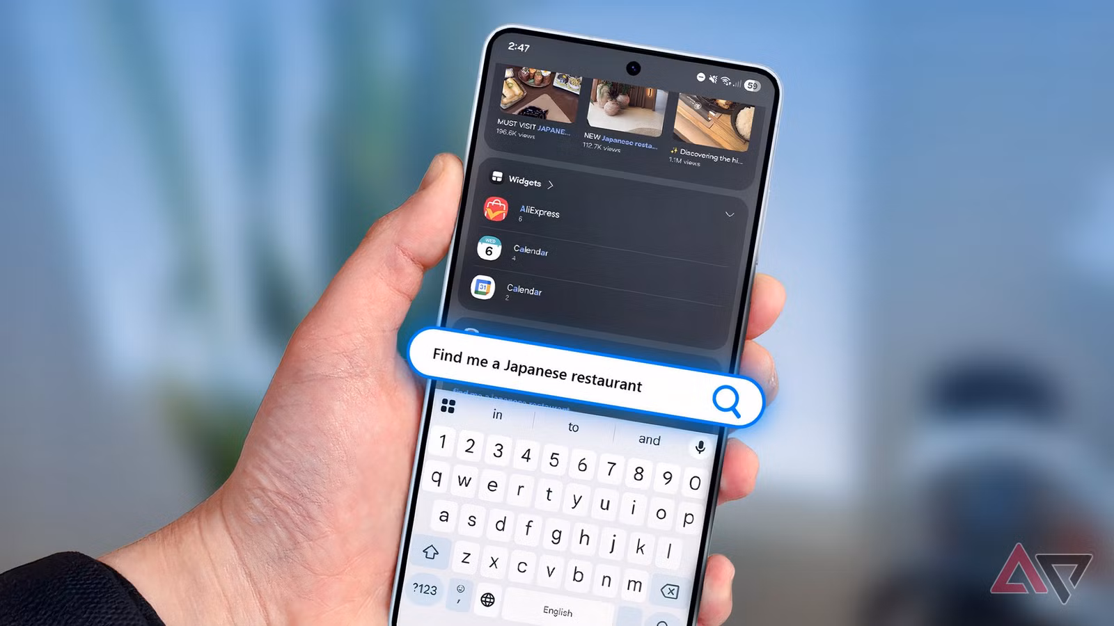 a hand holding a smartphone highlighting the samsung finder feature jpg