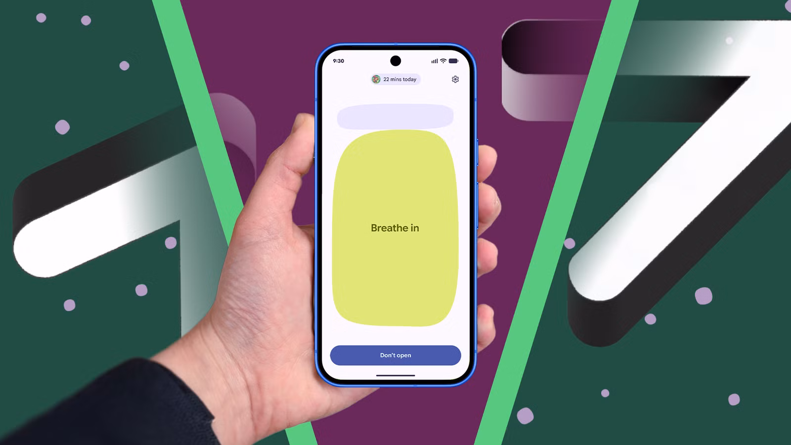 hand holding a smartphone showing android 17 s pause point breathing screen in front of a large andr avif
