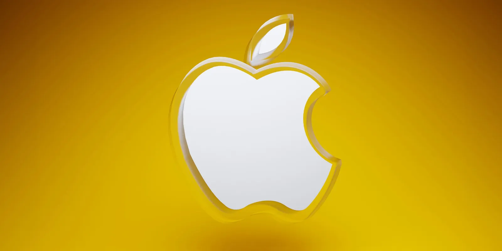يعتقد المحللون أن شركة Apple اتخذت خطوة غير عادية للغاية لمضاعفة قاعدة مستخدمي Mac | عرض شعار Apple من الأكريليك على خلفية صفراء برتقالية نابضة بالحياة