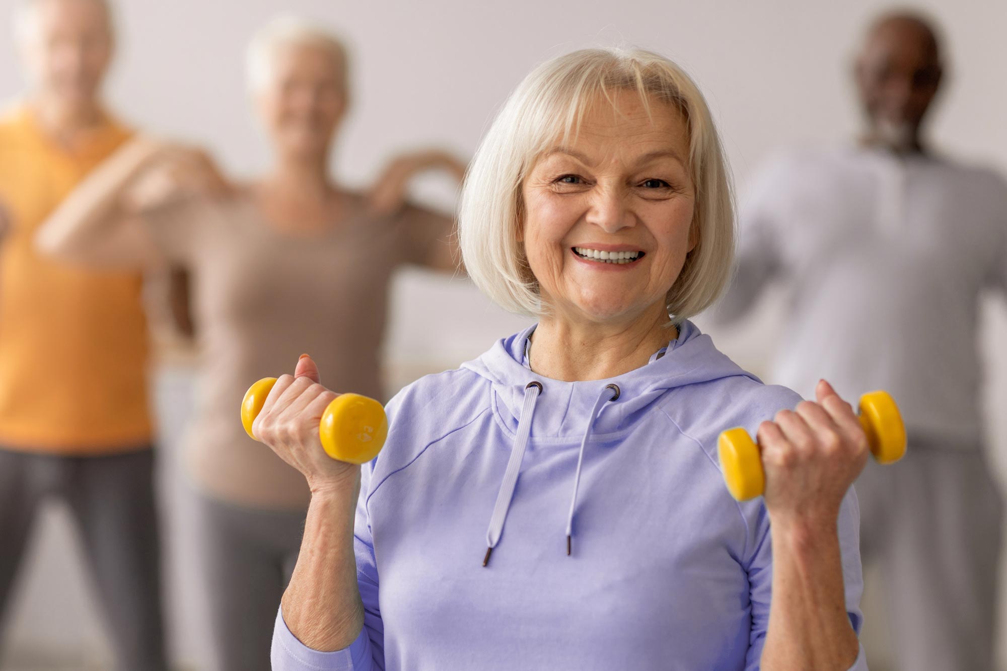 Senior Group Exercising With Weights jpg