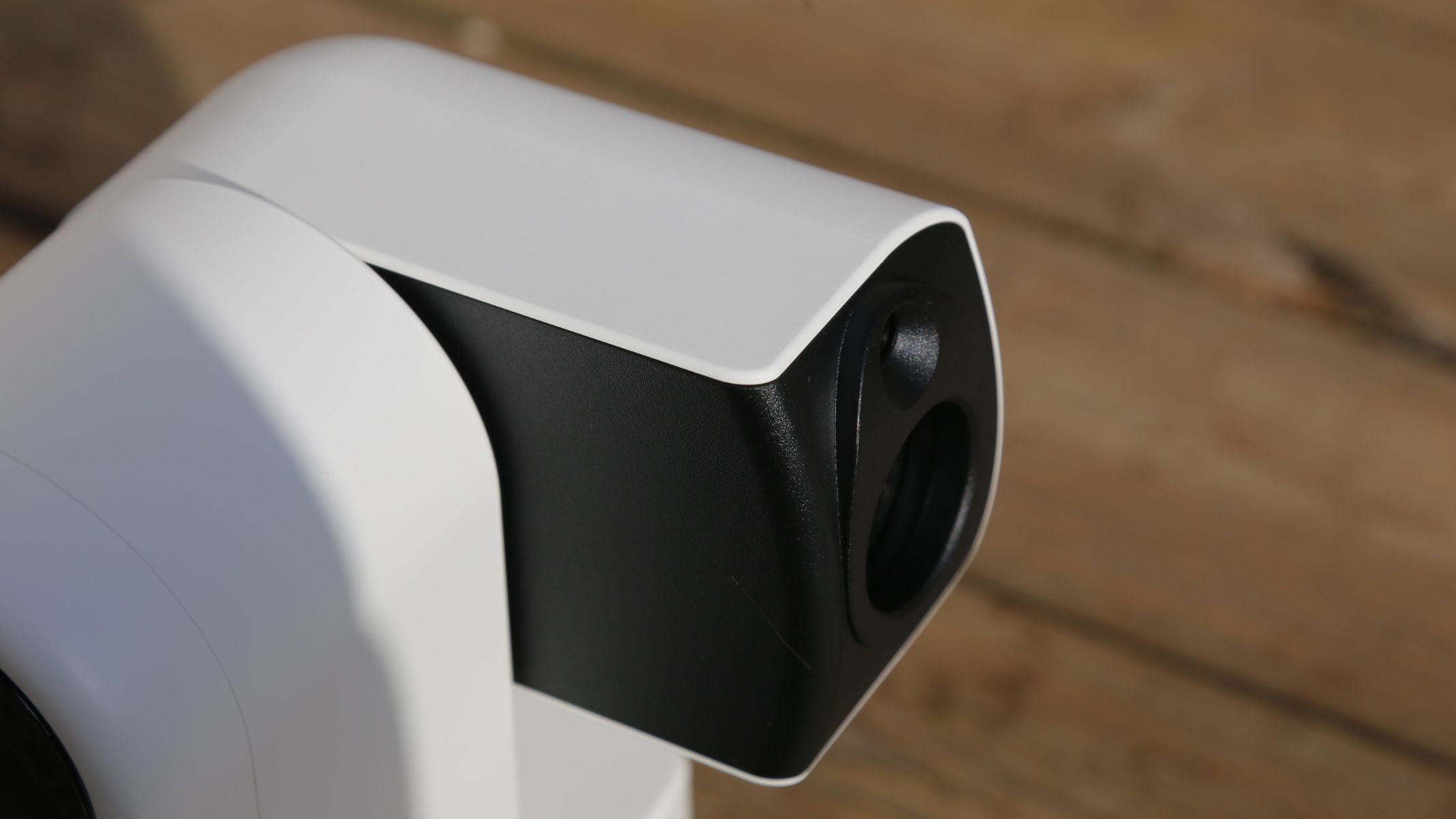 A close-up on the side of the optical tube on the ZWO Seestar S30 Pro.