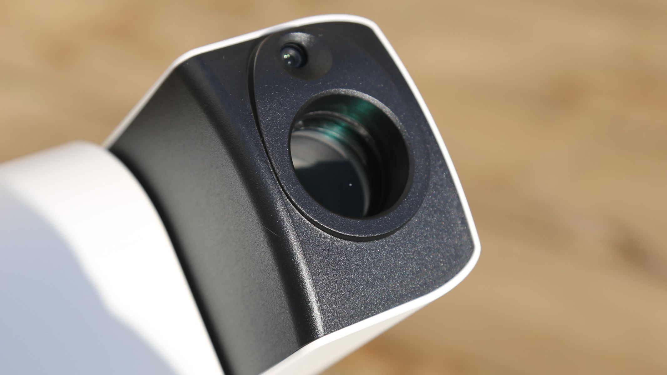 A close-up on the side of the optical tube on the ZWO Seestar S30 Pro pointing upwards.